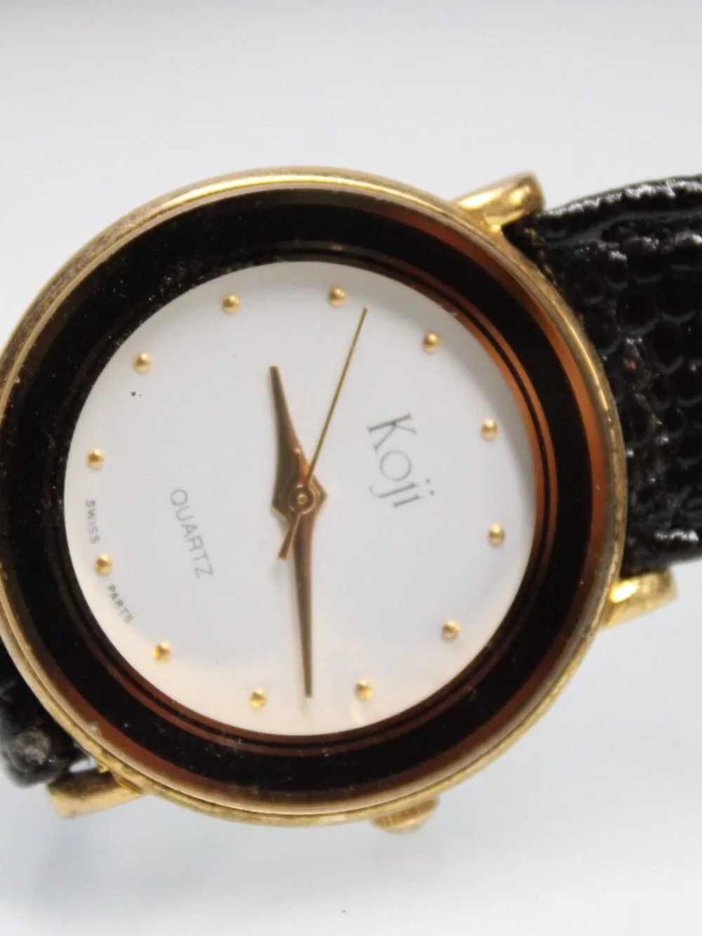 Koji Quartz Watch Swiss Parts Gold Tone White Dial Black Leather Band